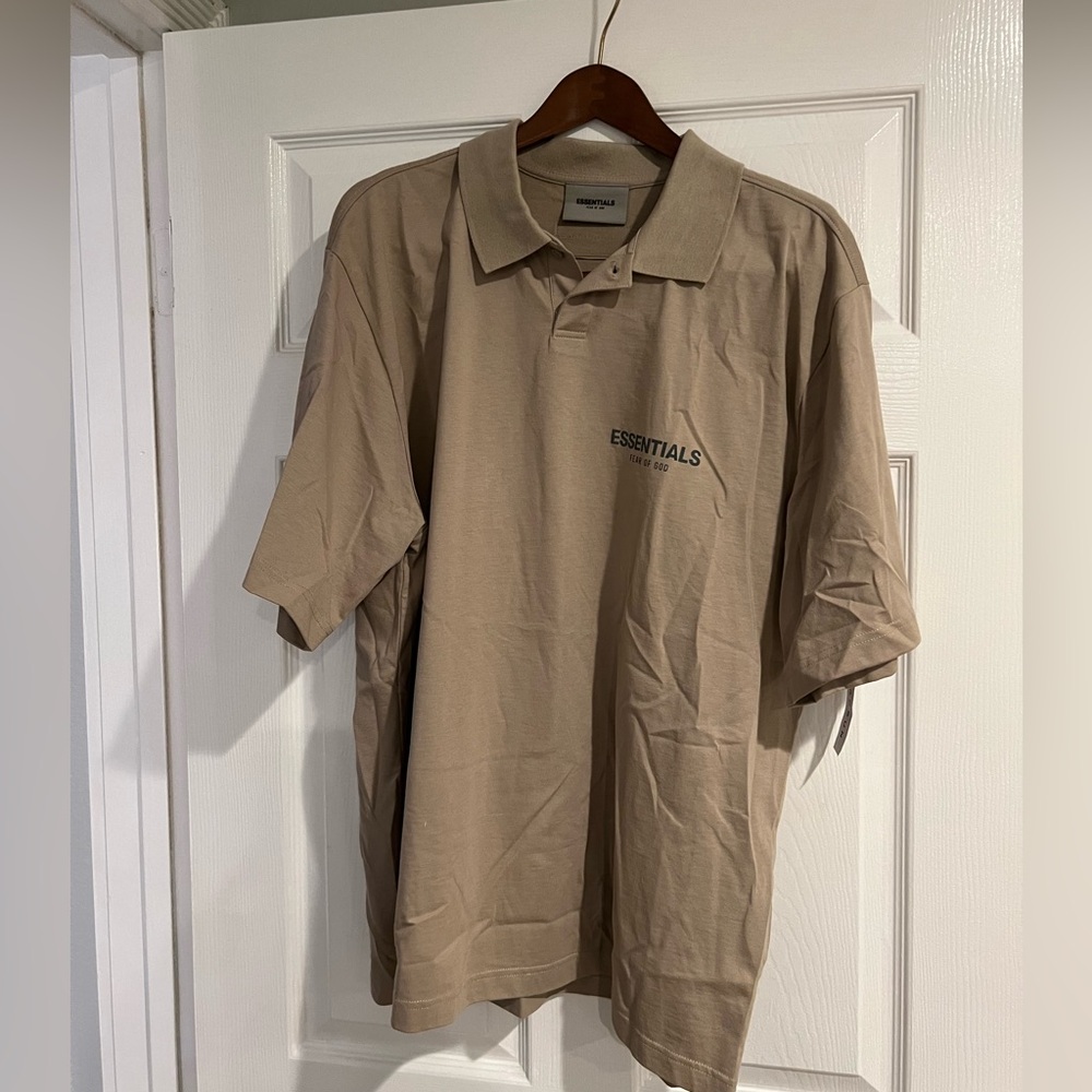 Original with tags essentials polo shirt!